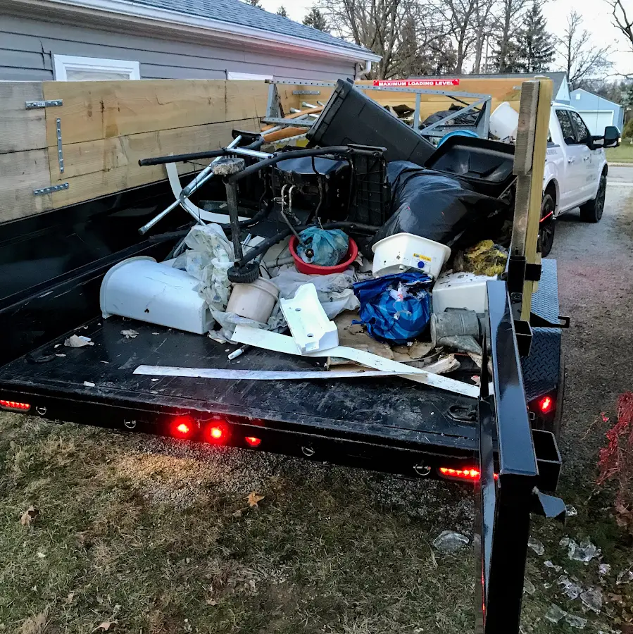 Roll-off dumpster delivered to a residential driveway in Carlinville